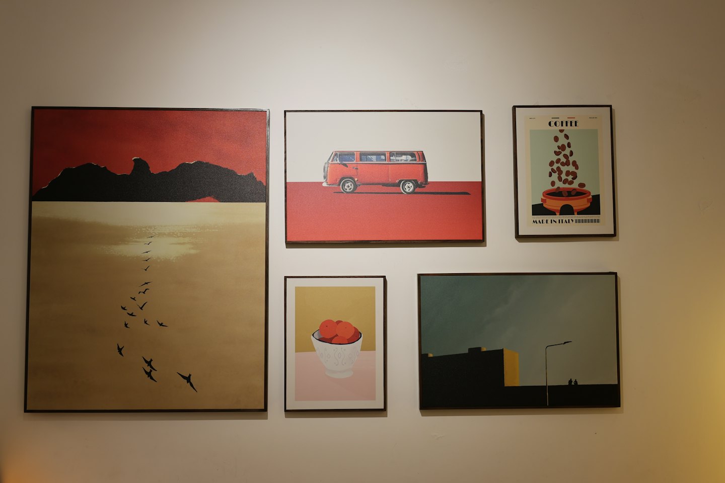 Five minimalist art prints displayed on a wall.
